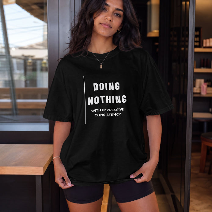 Doing Nothing – With Impressive Consistency Black T-Shirt